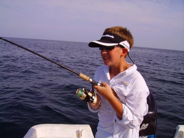 Ross fighting a nice Speckled Trout in Orange Beach