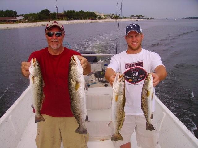 family speckled trout fishing in fort morgan, alabama