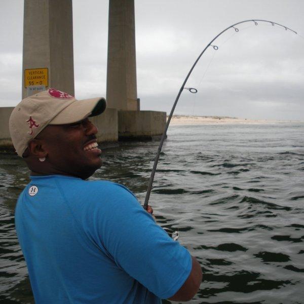 Calvin fights big redfish in Orange Beach, April 2010