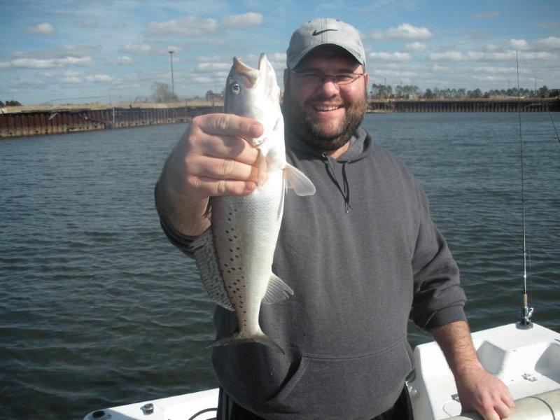 Ari catches his first speckled trout in Mobile River